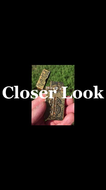 Serious bling lighter I found metal detecting, a closer look!