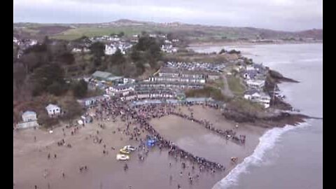 Hundreds of people dive into the waters of the UK on new years