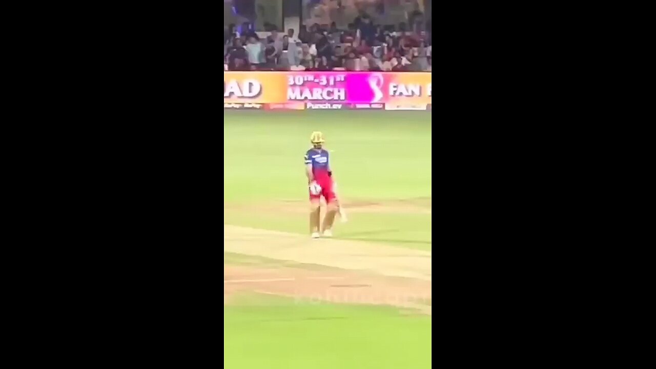 Virat Kohli meet a fan on field