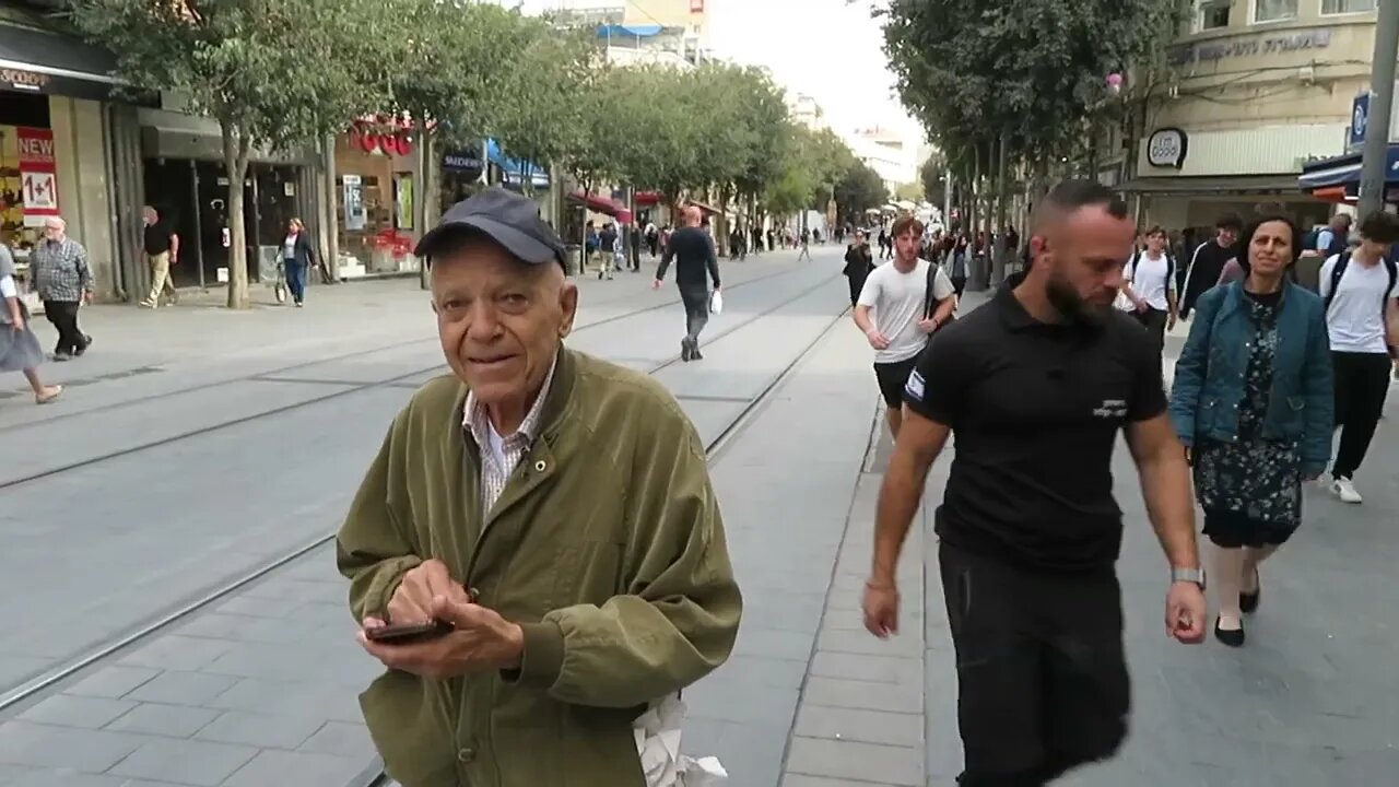 Abraham walks to the train stop on Jaffa Street in Jerusalem, with Steve Martin. Come walk with us!