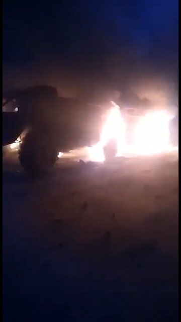 Ukrainian civilians ambushing Russian military vehicles with some Molotov cocktails.