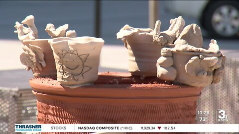 Ceramic artists help folks test out sculpting skills at Gene Leahy Mall