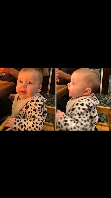 Baby's hilarious reaction to chef's fire at hibachi restaurant