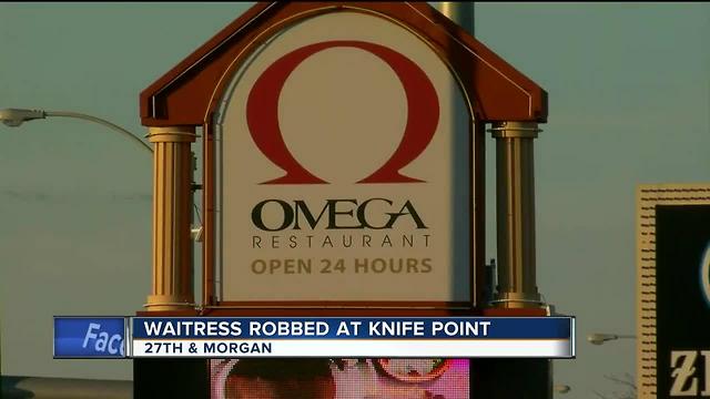 Robbery suspect holds Omega Restaurant waitress at knifepoint