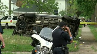 1 dead, toddler and woman hospitalized after pursuit ends in rollover crash; 2 suspects wanted