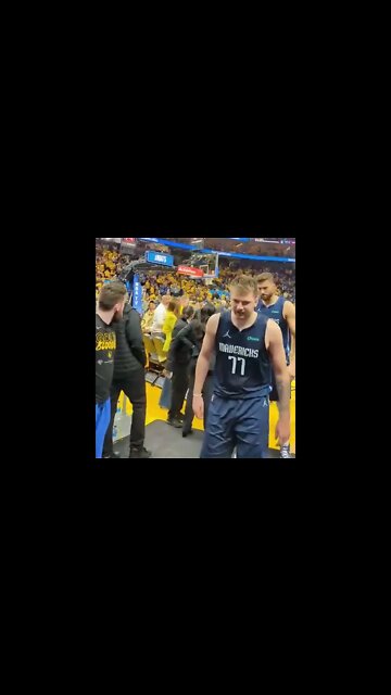 Luka Doncic and the Warriors fan going at it 👀