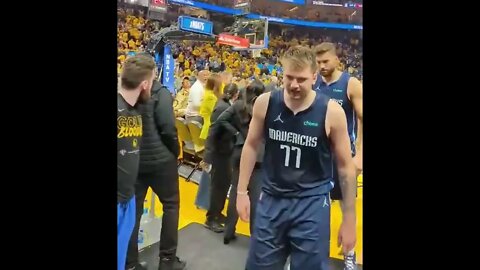 Luka Doncic and the Warriors fan going at it 👀