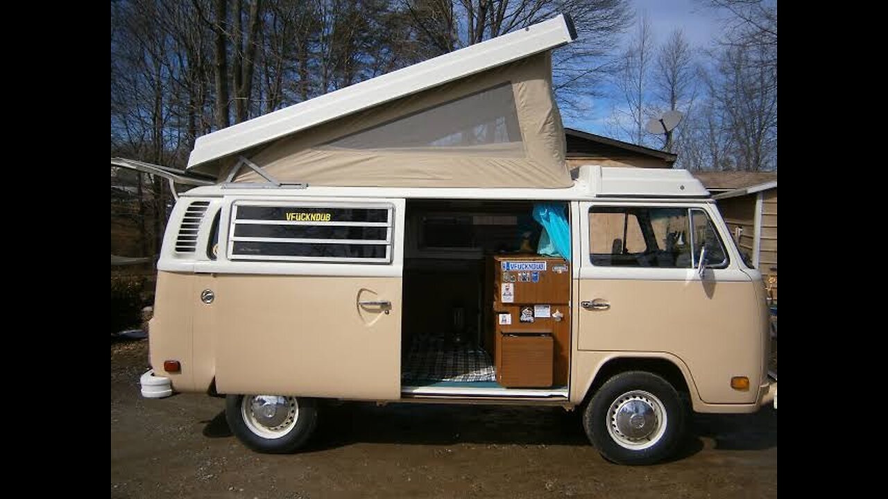 Solo camping in rain iconic 1975 Vw vain