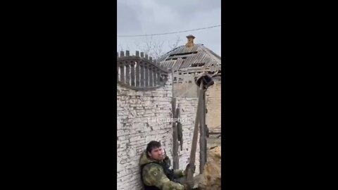 Chechen forces tease the enemy with a helmet on a stick