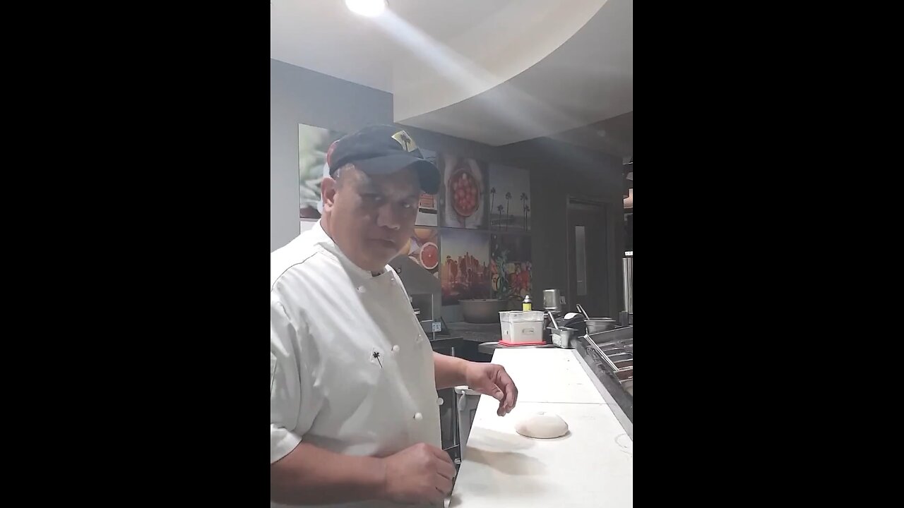 Stretching Dough Hand Tossed