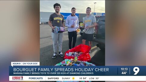 The Bourguet bunch spreads Christmas cheer to kids at Diamond Children's Medical Center