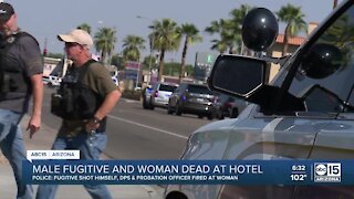 Male fugitive and woman dead at hotel