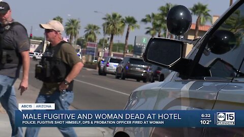 Male fugitive and woman dead at hotel