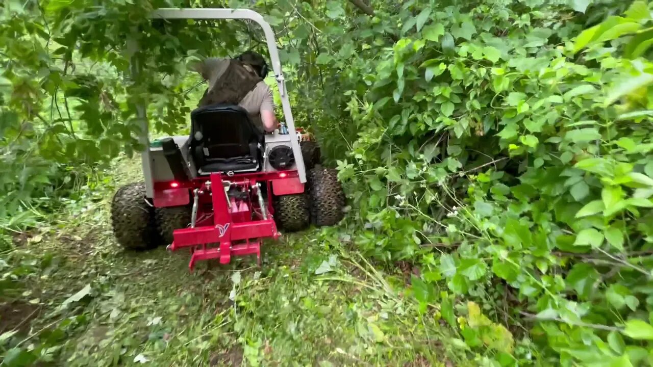 Diesel Ventrac 4500Y mowing a thick wet trail.