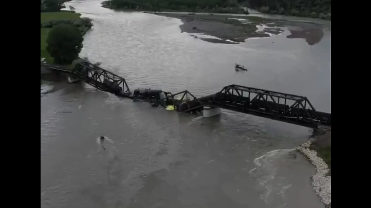 Train Derailment Causes Toxic Chemical Spill, Bridge Collapses