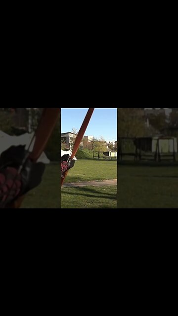 SHOOTING LONGBOW ARROW IN SLOW MOTION