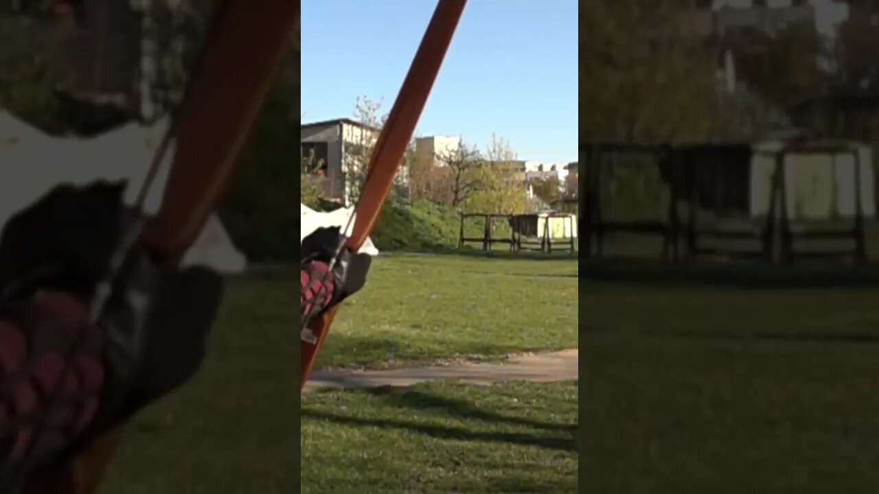 SHOOTING LONGBOW ARROW IN SLOW MOTION