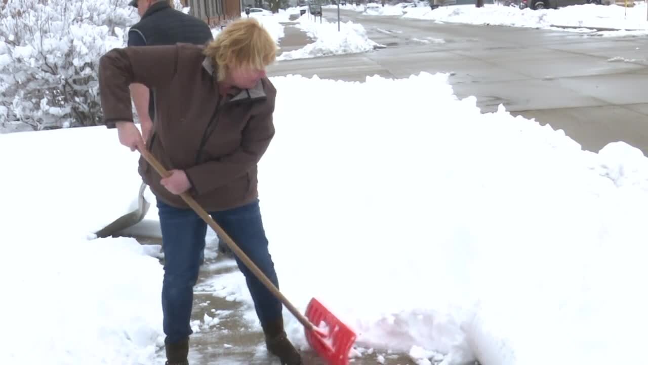 Despite winter fatigue, people in Oshkosh step up to help each other clear snow