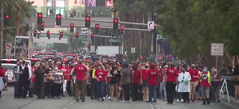 Culinary Union marchers call for restaurants to operate at full-strength