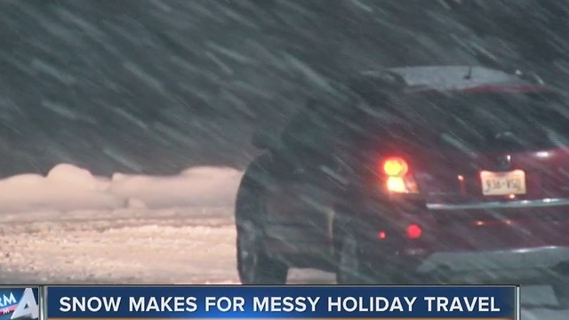 Friday snow slows down holiday travelers