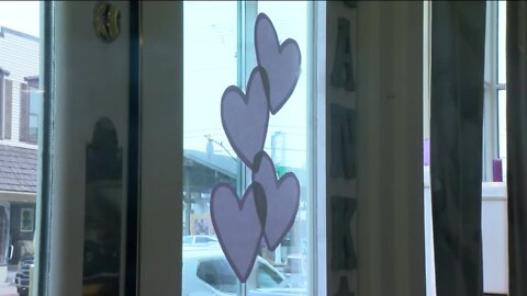 Sheb. Falls community shows up in purple to support 8-year-old Oliver Hitchcock's family