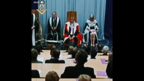 Trump wearing a Freemasonic ritual wearing a red robe,