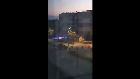 Terrified families watch #Russian troops in early morning patrols of #Berdyansk.