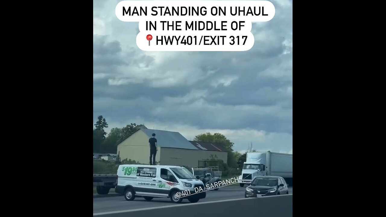 Man Stands On Van During Police Chase