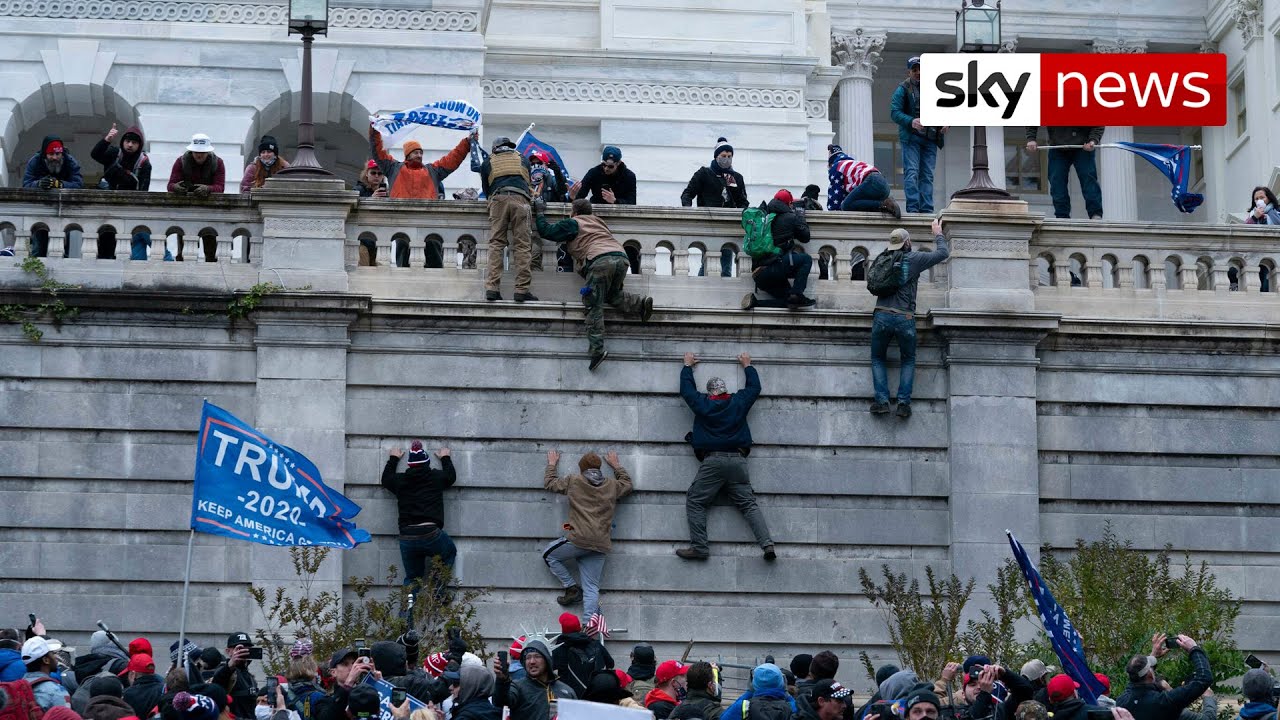 'Woman shot dead' after pro-Trump mob storms US Capitol