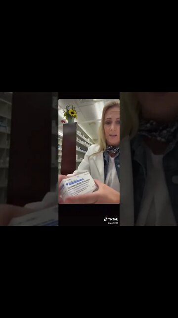 Pharmacist Opens Vaccine Box Insert