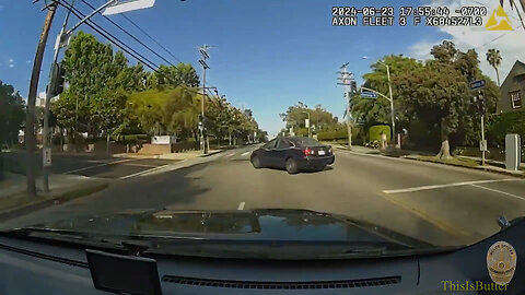 LAPD dashcam shows officers responding to a call, crashing into a car that was turning left