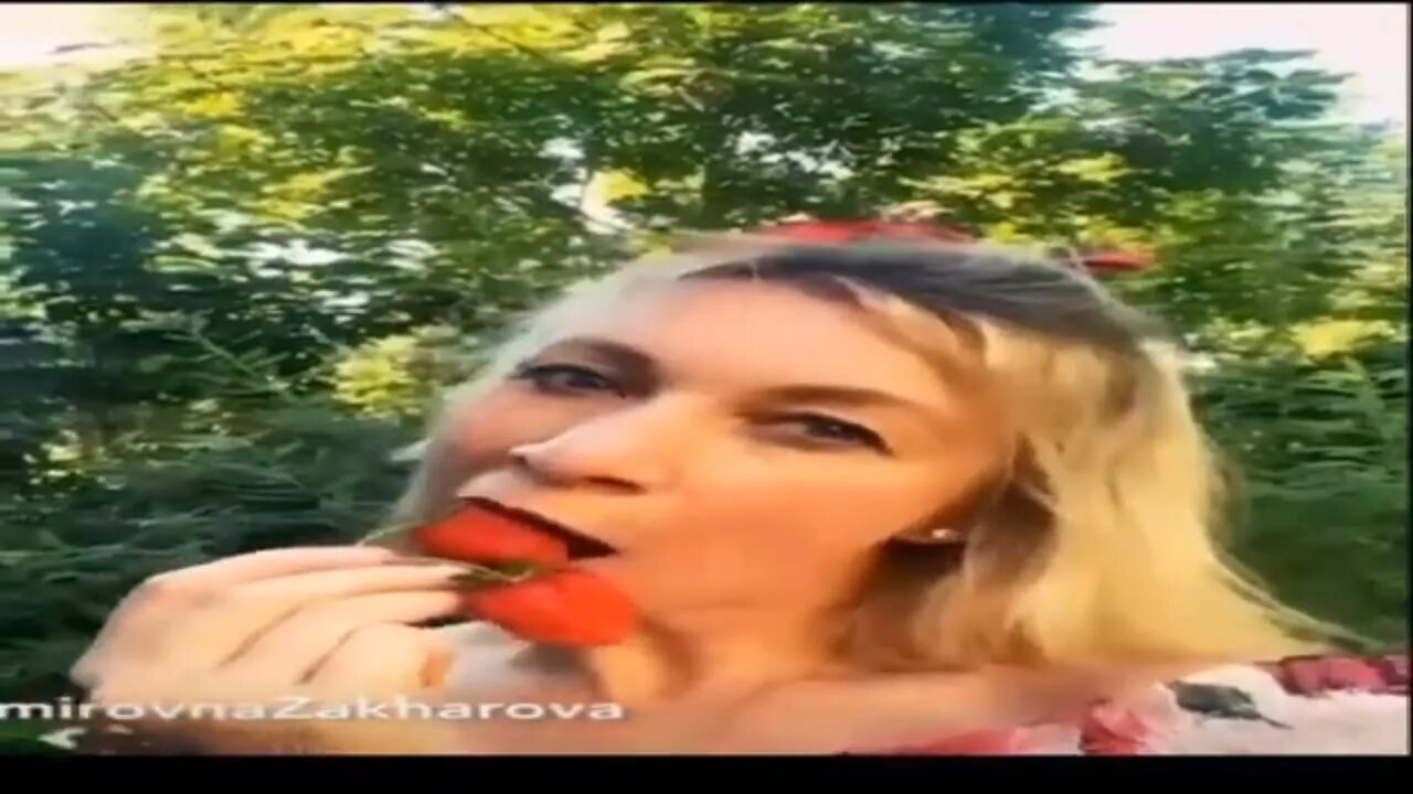 PUTIN'S SPOKESWOMAN MARIA ZAKHAROVA SEDUCTIVELY EATS STRAWBERRIES