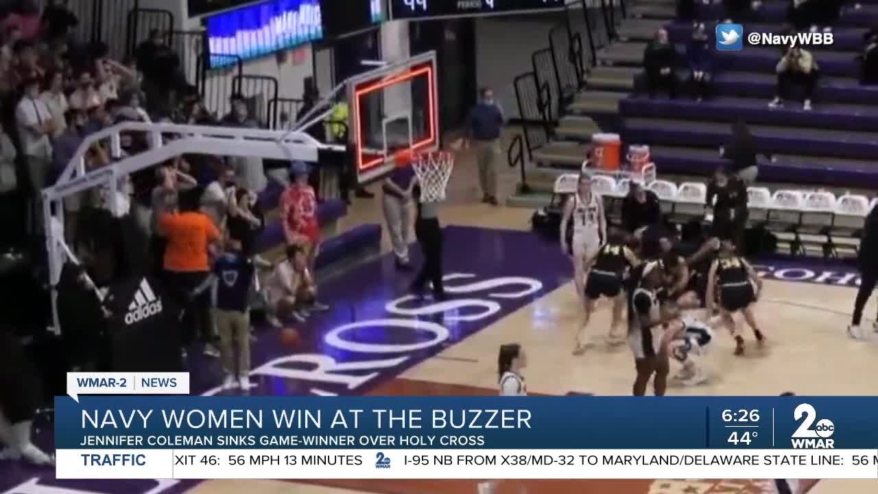 Navy beats the buzzer to stun top-seeded Holy Cross