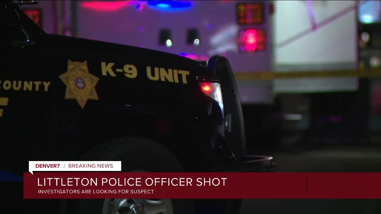 Littleton police officer shot, manhunt underway for suspect