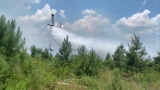 AFC Plane Drops Water On Warren Prairie WMA Fire On Saturday July 22nd 2022