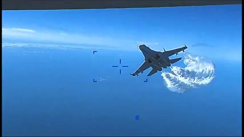 Russian Su-27 fighter dropping fuel on an American MQ-9 Reaper UAV in the sky over the Black Sea