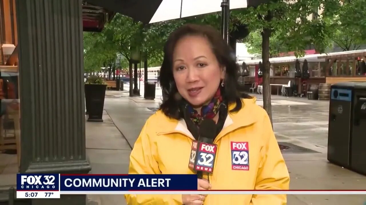 Man points gun at chicago news tv crew during live broadcast