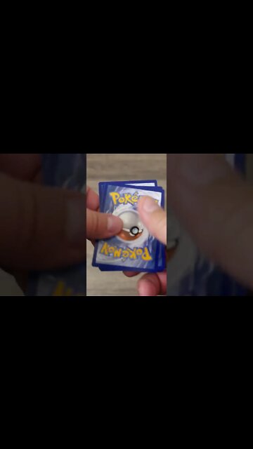 #SHORTS Unboxing a Random Pack of Pokemon Cards 077