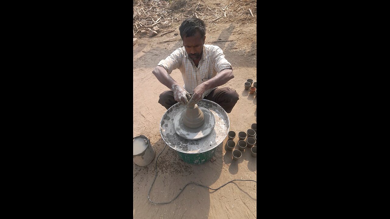 India making a dirt pot