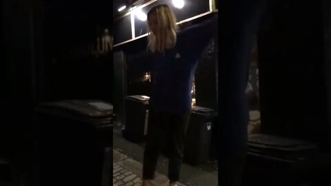 Women slips onto pole