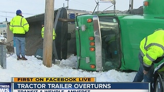 Tractor trailer rolls over in Amherst