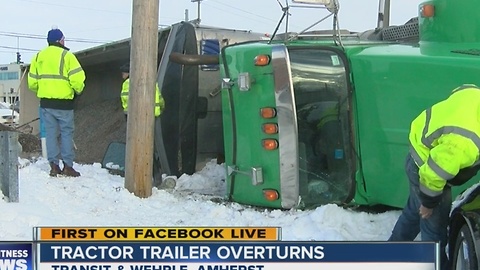 Tractor trailer rolls over in Amherst