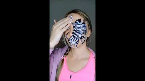 Clever Painting of the Zebra on the side of the face. Good action Too. Love