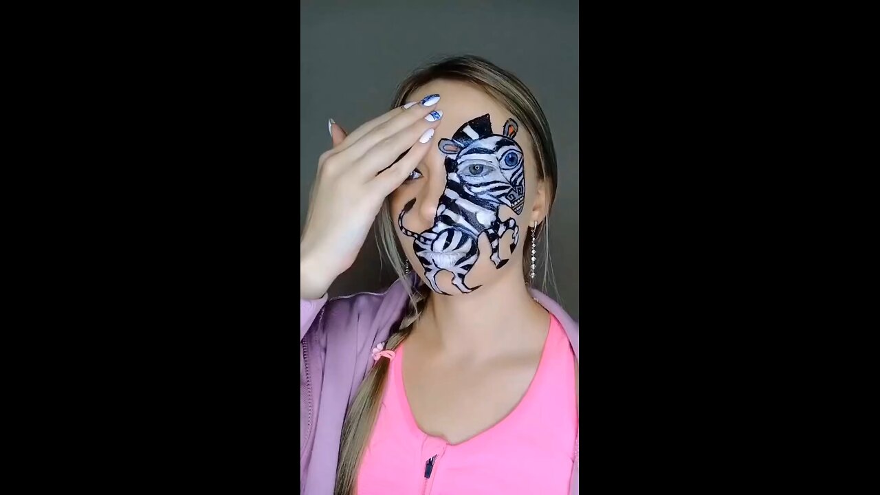 Clever Painting of the Zebra on the side of the face. Good action Too. Love