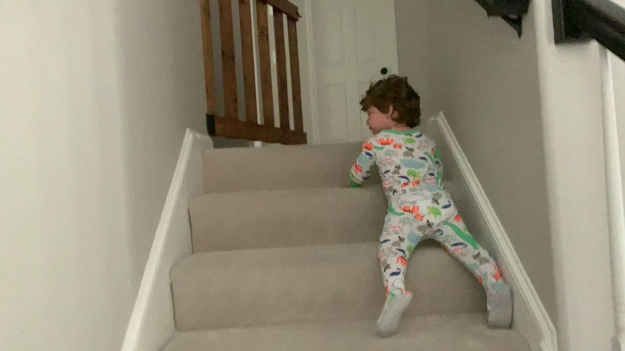 Grant going down the stairs