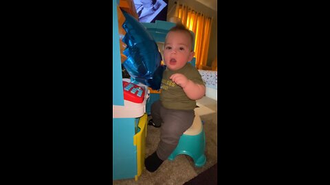 Baby plays with a balloon for the first time!