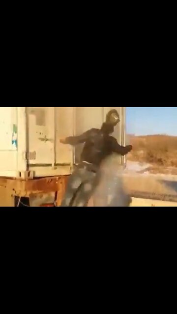 Truck Driver Almost Gets His Head Taken Off When His Trailor Doors Blow Open