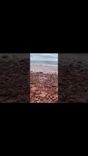 Many rocks with waves crashing