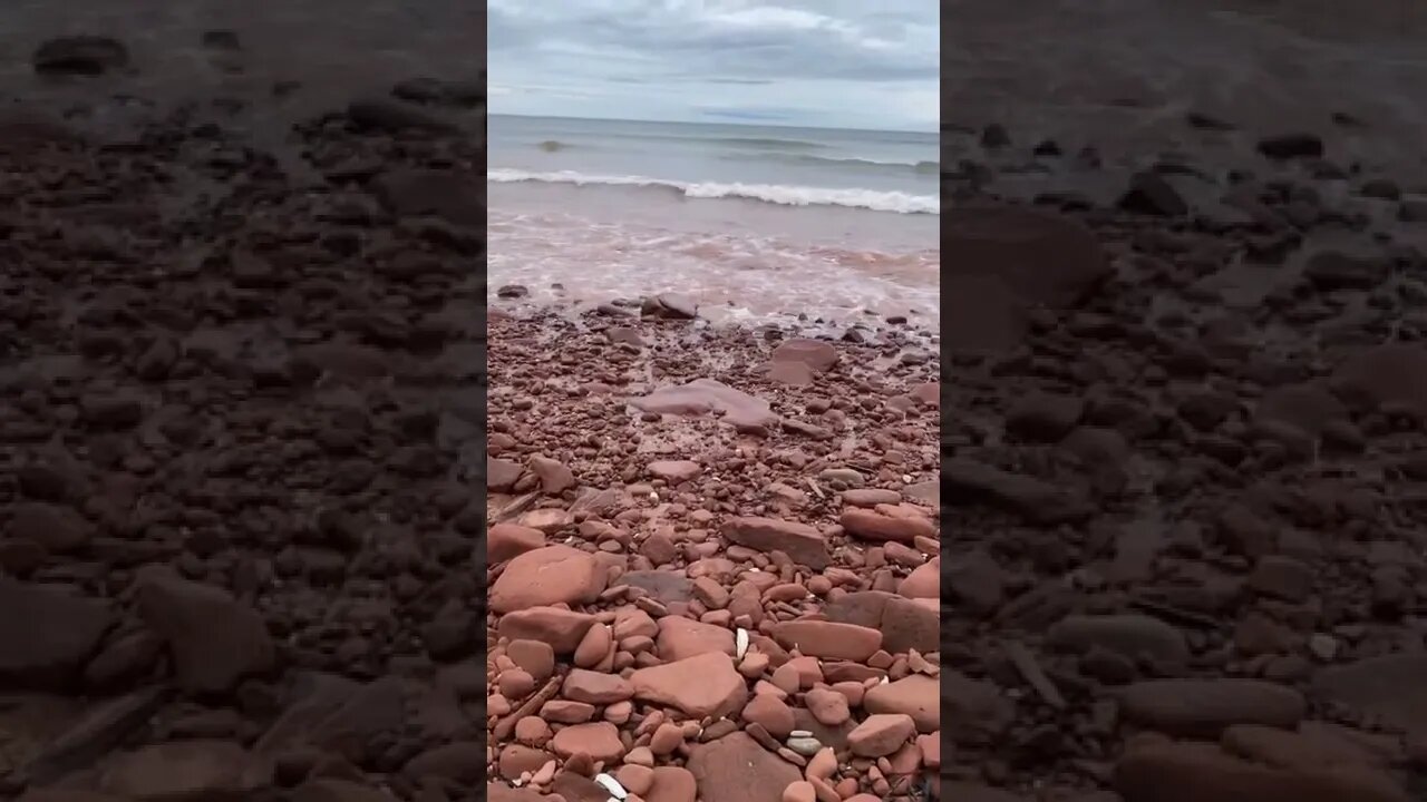 Many rocks with waves crashing