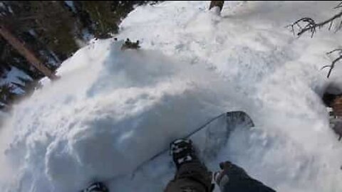 Join this snowboarder on his death-defying downhill descent!